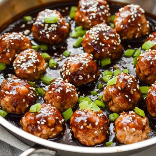 Sticky Sesame Garlic Chicken Meatballs  A Sweet and Savory Delight!